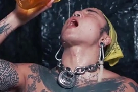 Yoshikawasaki, a hunky Asian jock with a tattooed body and a big cock, indulges in hardcore fetish play. He pisses into a glass, downs it, then jerks off, climaxing on camera.