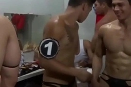 Sultry Thai go-go dancer, a model in the raw, struts his stuff onstage, teasing with rhythmic hip movements. Behind the curtain, he sheds his clothes, exposing his Asian charm and gay allure.