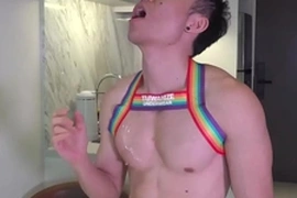 Sultry Asian hunk flaunts his sculpted physique, commanding muscle worship. His chiseled abs and massive pecs create a symphony of desire, culminating in a decadent, messy tribute. Fit Asian, muscular, smooth - an irresistible feast for the senses.