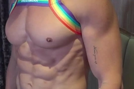 A stunning Asian hunk flaunts his sculpted abs, muscular back, and massive pecs, inviting adoration. His lean, chiseled physique embodies the perfect fusion of beauty and brawn, captivating viewers with his Asian muscle worship allure.