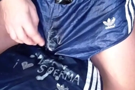 Spring time means cum-time shiny sportwear shorts cum action
